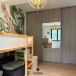 aménagement chambre enfant avec revêtement panoramique mural jungle